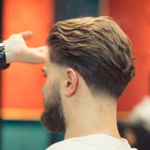 low fade taper avec cheveux longs